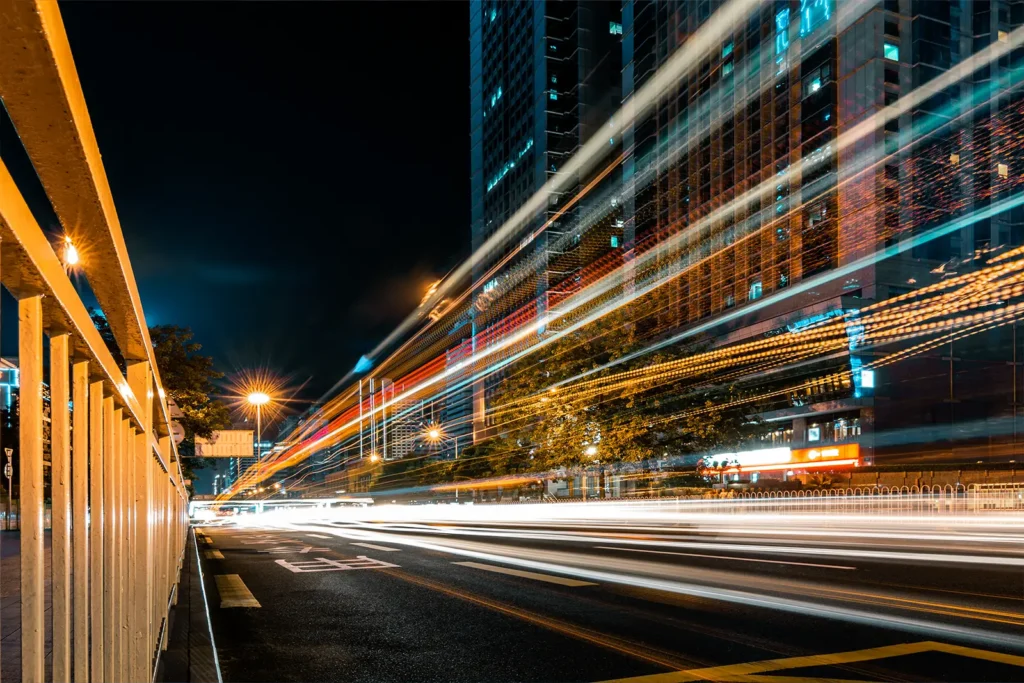 Timelapse exposure of vehicle lights on a busy city street at night